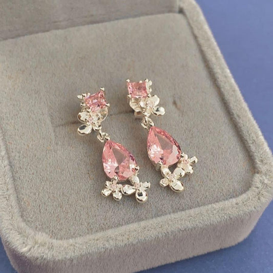 Aretes de piedra rosa