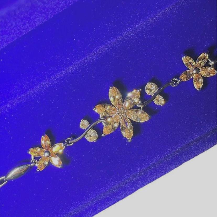 Pulsera de flores (rodio)