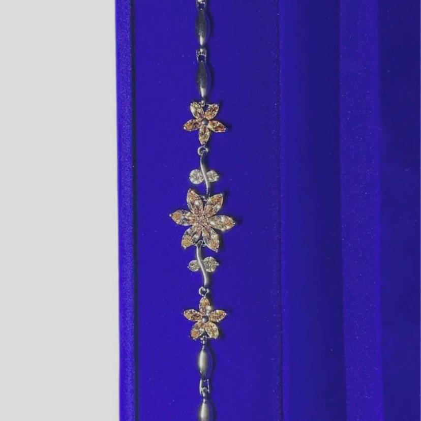 Pulsera de flores (rodio)